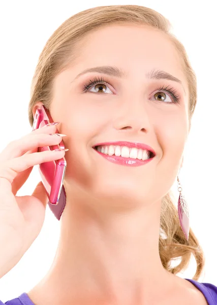 Счастливая девушка с розовым телефоном — стоковое фото