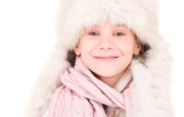 Glückliches Mädchen mit Wintermütze — Stockfoto