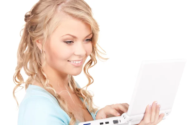 便携式计算机的幸福女人 免版税图库图片