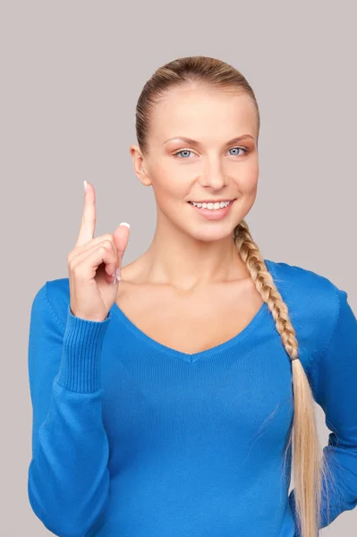 Mujer con el dedo en alto —  Fotos de Stock