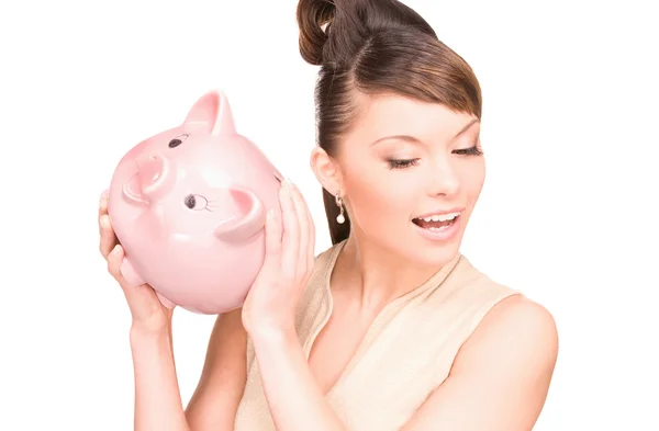 Mooie vrouw met piggy bank — Stockfoto