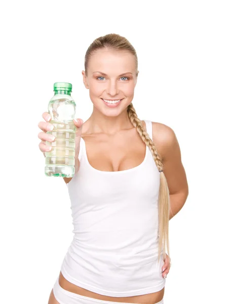 Vacker kvinna med en flaska vatten Stockfoto