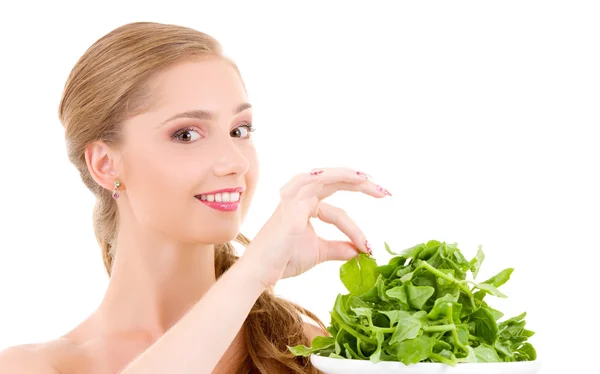Happy woman with spinach — Stockfoto