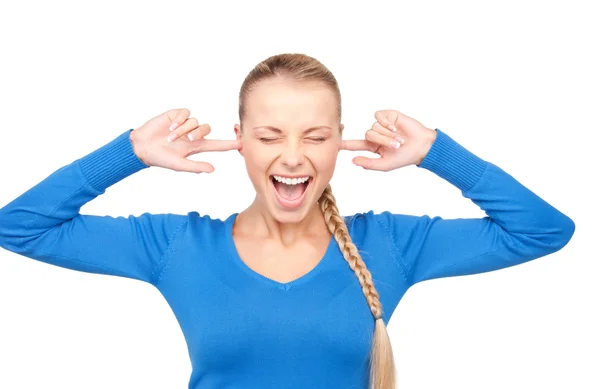 Mujer sonriente con los dedos en las orejas —  Fotos de Stock