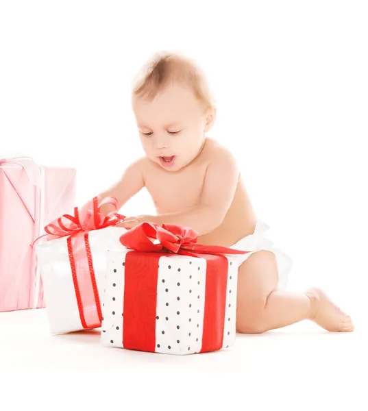 Baby boy with gifts — Stock Photo, Image