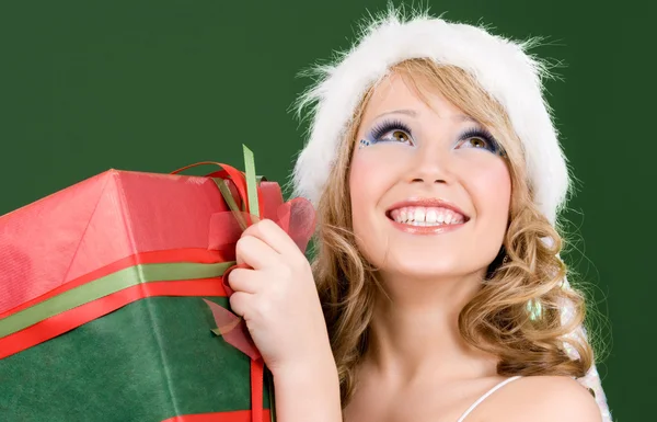 Happy santa helper with gift box — Stock Photo, Image