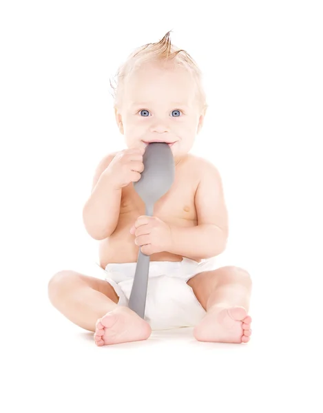 Baby boy with big spoon — Stock Photo, Image