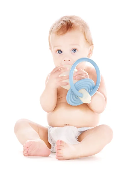 Baby boy with big pacifier — Stock Photo, Image