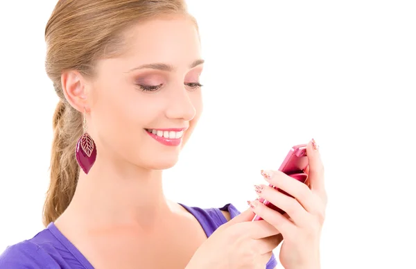 Happy teenage girl with cell phone Stock Picture