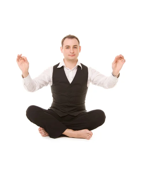 Businessman sitting in lotus pose — Stock Photo, Image