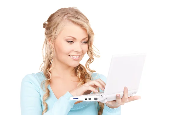 便携式计算机的幸福女人 图库照片