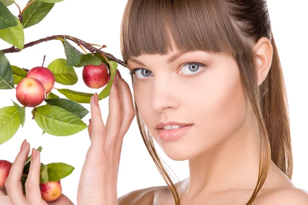 Lovely woman with apple twig Royalty Free Stock Images