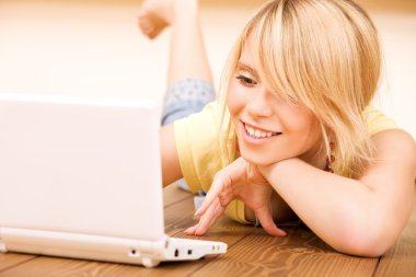 Teenage girl with laptop computer clipart