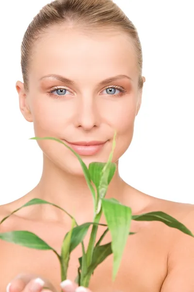 Woman with sprout — Stock Photo, Image