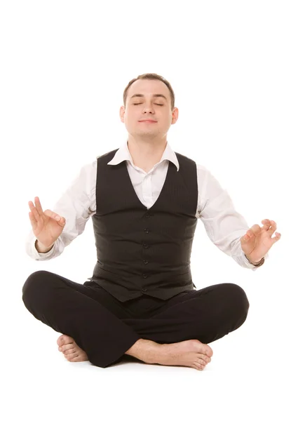 Businessman sitting in lotus pose — Stock Photo, Image