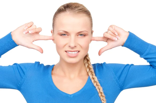 Woman with fingers in ears — Stock Photo, Image
