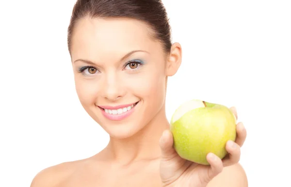 Young beautiful woman with green apple Stock Image