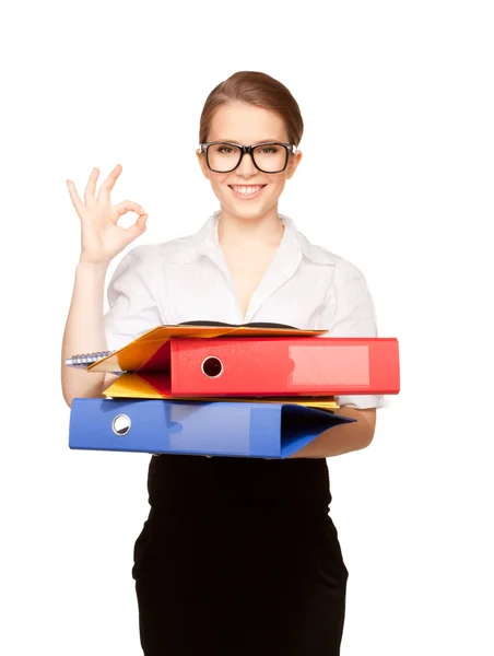 Young attractive businesswoman with folders — Stock Photo, Image