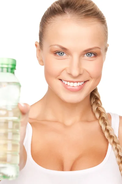 Vacker kvinna med en flaska vatten Stockbild