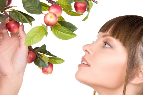 Mujer encantadora con ramita de manzana —  Fotos de Stock