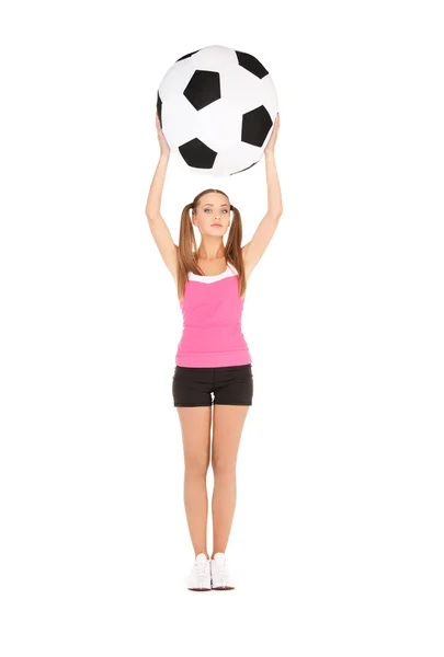 Belle femme avec un grand ballon de football — Photo