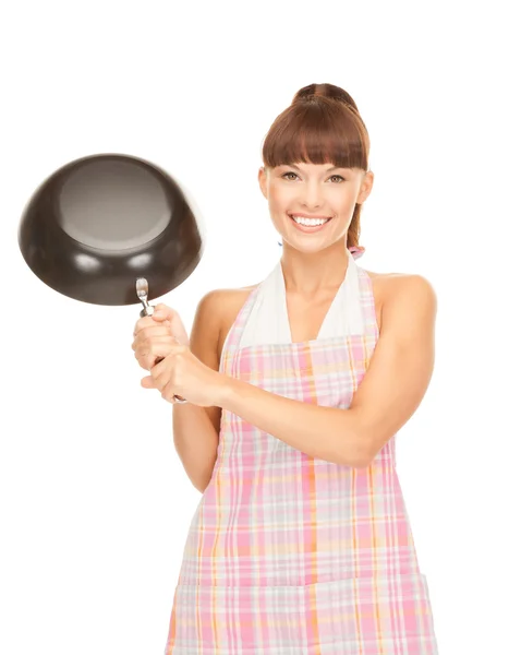 Домохозяйка с сковородкой — стоковое фото