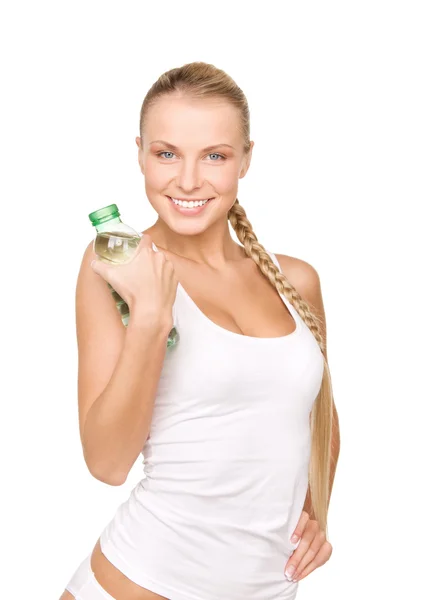 Mooie vrouw met fles water — Stockfoto