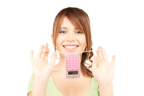 Härlig tonårsflicka med miniräknare — Stockfoto