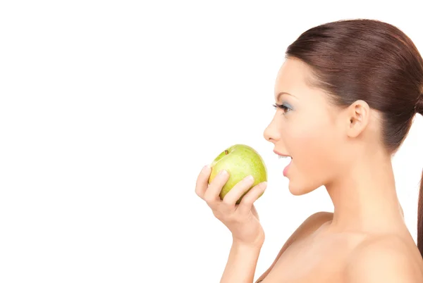 Молода красива жінка з зеленим яблуком — стокове фото
