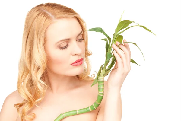 Vrouw met sprout over Wit — Stockfoto
