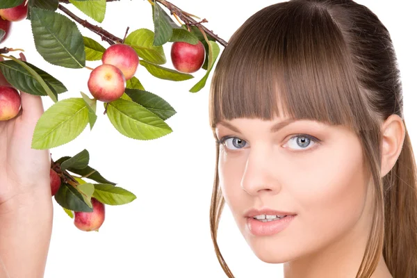 Lovely woman with apple twig Royalty Free Stock Photos
