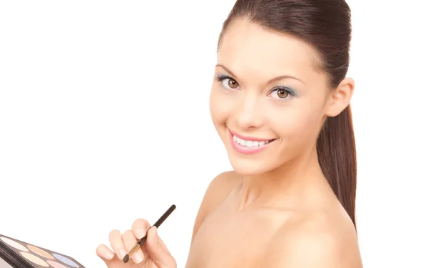 Lovely woman with palette and brush — Stock Photo, Image