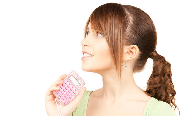 Lovely teenage girl with calculator — Stock Photo, Image