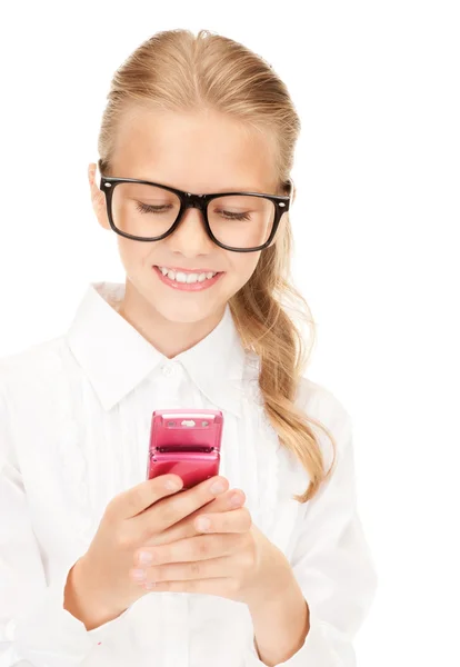 Gelukkig meisje met mobiele telefoon — Stockfoto