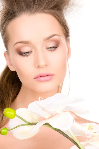 Beautiful woman with white flower Stock Picture