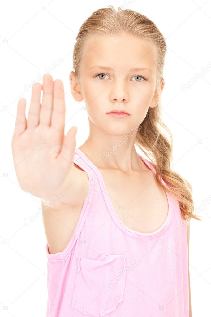 Lovely girl showing stop sign — Stock Photo © Syda_Productions #3776425