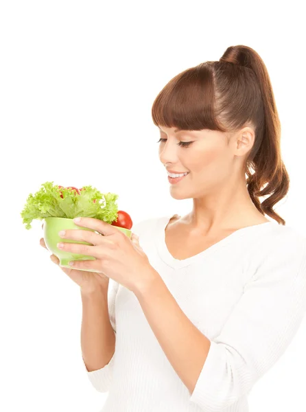 Schöne Hausfrau mit Gemüse — Stockfoto