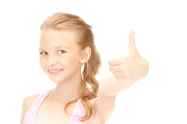 Lovely girl showing thumbs up sign — Stock Photo, Image