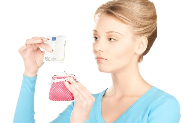 Lovely woman with purse and money Stock Picture