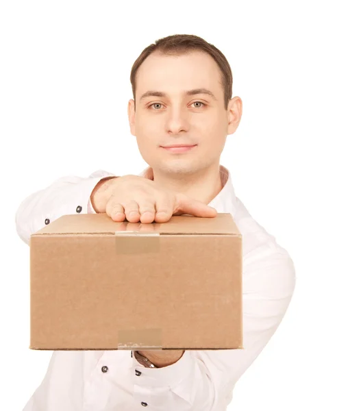 Businessman with parcel — Stock Photo, Image