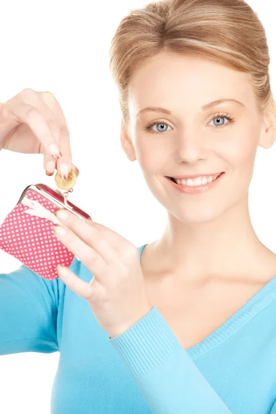 Lovely woman with purse and money Royalty Free Stock Photos