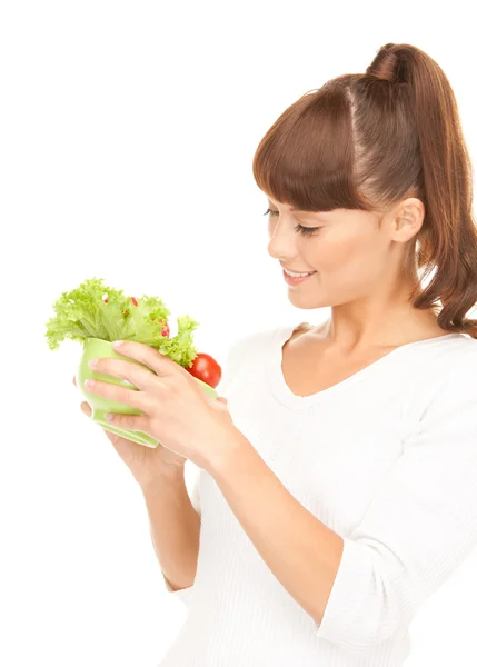 Prachtige huisvrouw met groenten — Stockfoto