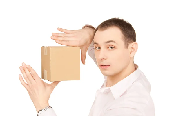 Businessman with parcel — Stock Photo, Image