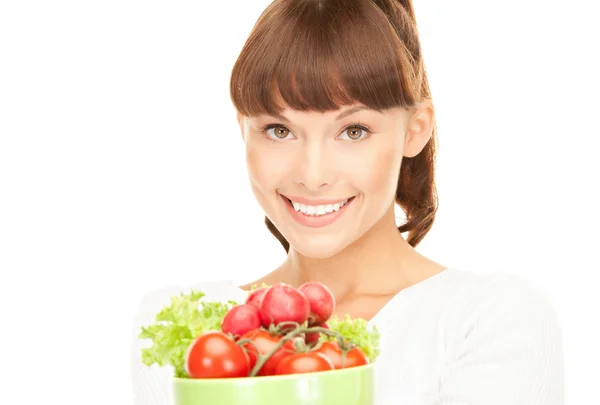 Schöne Hausfrau mit Gemüse — Stockfoto