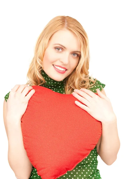 Kobieta z czerwona Poduszka w kształcie serca — Zdjęcie stockowe