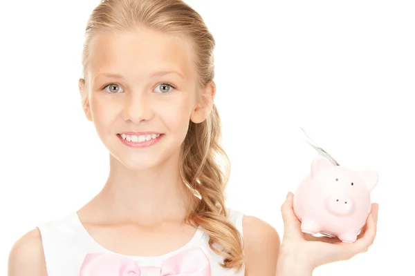 Schöne Teenager-Mädchen mit Sparschwein und Geld — Stockfoto
