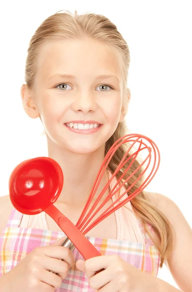 Kleine Hausfrau mit roter Kelle — Stockfoto