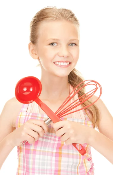 Little housewife with red ladle — Stock Photo, Image