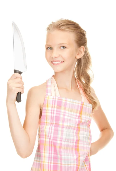 Petite femme au foyer avec couteau — Photo