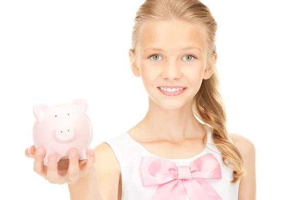Linda menina adolescente com banco porquinho — Fotografia de Stock